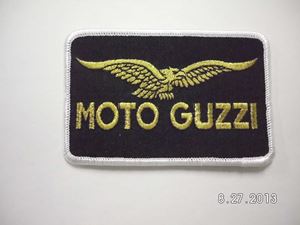 Picture of Moto Guzzi metallic gold wht border 2 1/2"H x 4"W